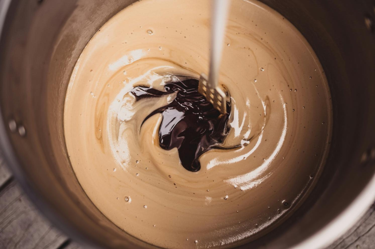 Students practicing advanced knife techniques during hands-on culinary session